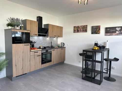 Η κουζίνα ή μικρή κουζίνα στο cameiroo - Penthouse Euskirchen