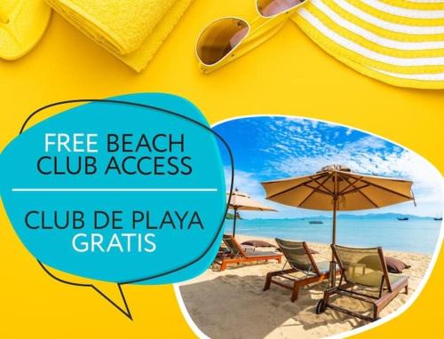a yellow wall with chairs and umbrellas on a beach at DUCASSI DELUXE playa LOS CORALES - rooftop pool and restaurants in Punta Cana