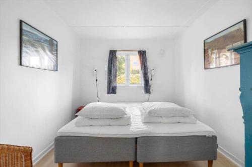 Postel nebo postele na pokoji v ubytování 5609-Svaneke-Reberbanevej-1