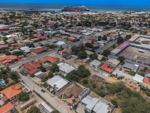 an aerial view of a city with houses at Hotel experience with daily housekeeping and laundry in Oranjestad