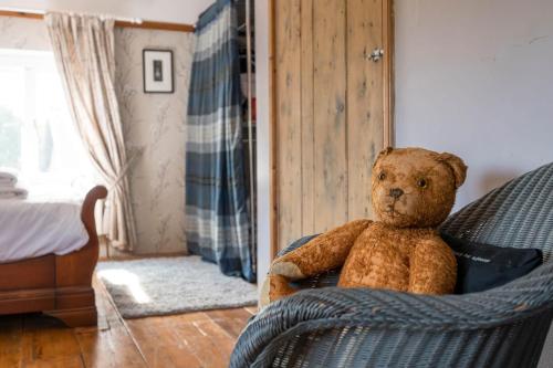Postel nebo postele na pokoji v ubytování Farm View suite, Kelsale