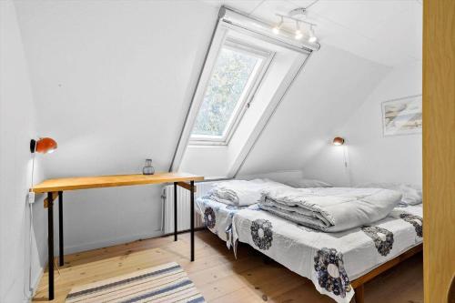 Postel nebo postele na pokoji v ubytování 4769-Ostermarie-Slamrebjergvej-22