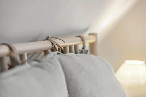 a bunch of towels hanging on a rail at 5561-Gudhjem-Kirkevej-8 in Gudhjem