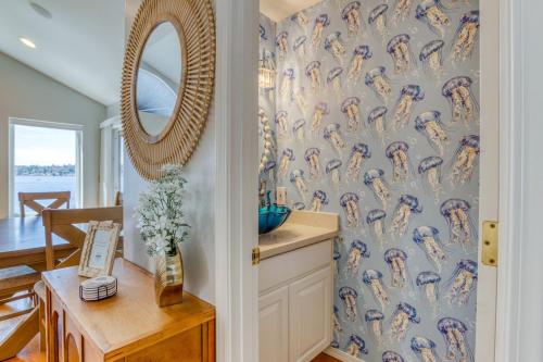 a dining room with a wall mural of swans at Lakefront Oasis at Lake Stevens in Lake Stevens