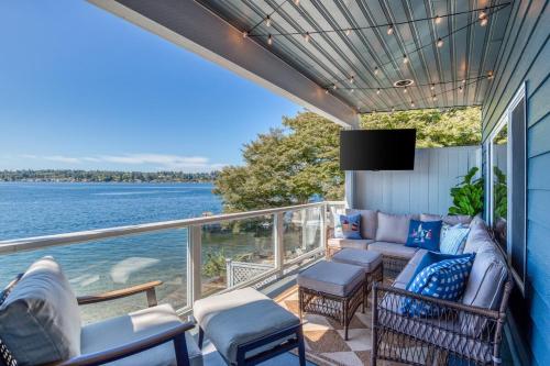 a balcony with a view of the water at Lakefront Oasis at Lake Stevens in Lake Stevens
