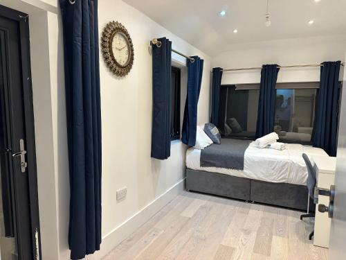 Ένα ή περισσότερα κρεβάτια σε δωμάτιο στο Eltham Hill Stay