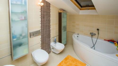 Kúpeľňa v ubytovaní Apartment Lunta
