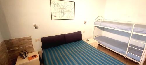 En eller flere senge i et værelse på Villino Indipendente