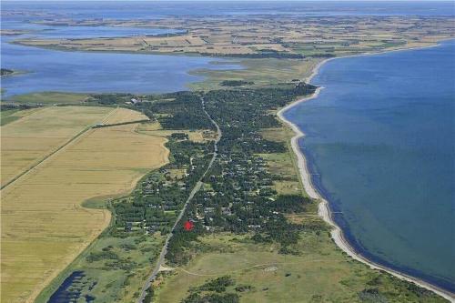 an aerial view of a beach and the ocean at LF584-Hurup-Thy-Haettemagevej-4 in Sindrup