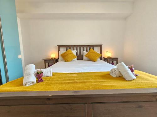Ένα ή περισσότερα κρεβάτια σε δωμάτιο στο Relaxing 1 BR Flat with terrace and parking