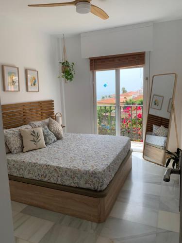 Katil atau katil-katil dalam bilik di Apartamento con jacuzzi y terraza con opcion a Piscina Privada