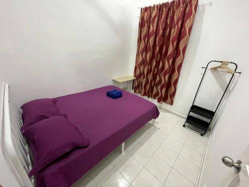 Ένα ή περισσότερα κρεβάτια σε δωμάτιο στο House near KT Atas Toll Netflix
