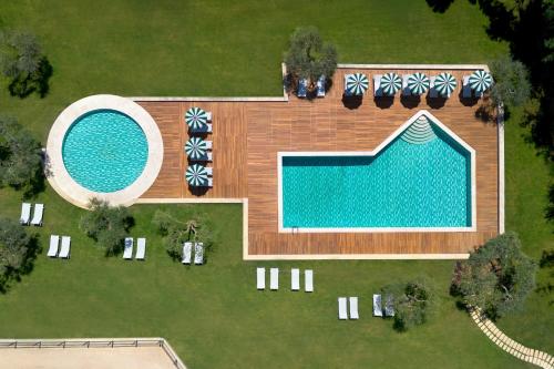 an overhead view of a swimming pool in a yard at Villa Ermellina Siena, a Tribute Portfolio Hotel in Siena