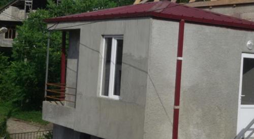 a small building with a window on top of it at House near The Black Sea in Makhinjauri