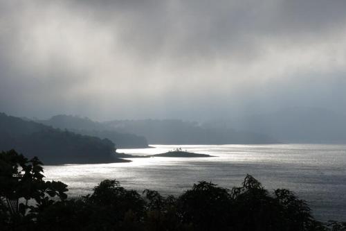 an island in the middle of a large body of water at Casita Amapola in Tilarán