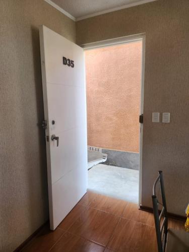 an open door to a room with a door at Apartamento duplex en ICA in Pueblo Nuevo