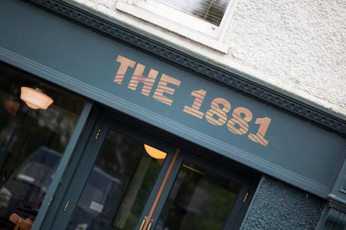 a sign on the door of a restaurant at Garden Apartment in Monaghan