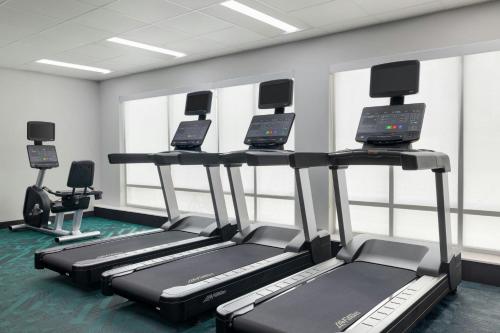 a row of treadmills in a gym at TownePlace Suites by Marriott Humble Intercontinental Airport in Humble