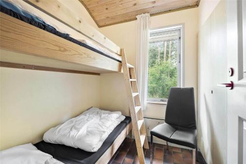 Postel nebo postele na pokoji v ubytování OH167-Hadsund-Jaegerskoven-8