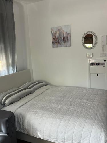 Ένα ή περισσότερα κρεβάτια σε δωμάτιο στο Apartman AS