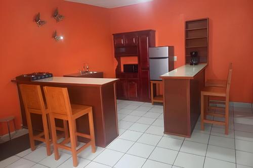 Kuchyň nebo kuchyňský kout v ubytování Departamento Acosta 2