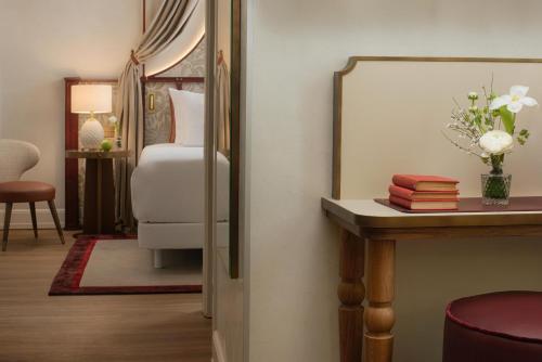Katil atau katil-katil dalam bilik di NH Collection Firenze Porta Rossa