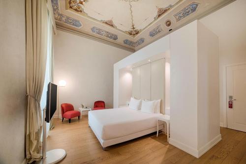 Katil atau katil-katil dalam bilik di NH Collection Firenze Porta Rossa