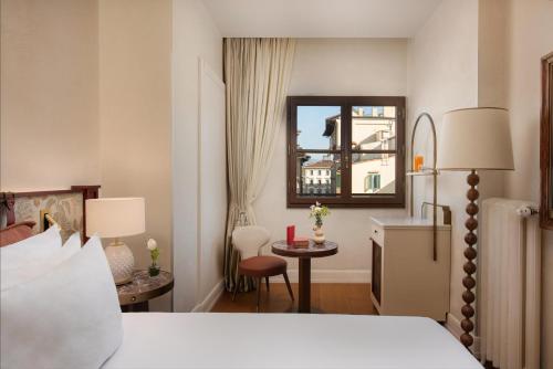 Katil atau katil-katil dalam bilik di NH Collection Firenze Porta Rossa