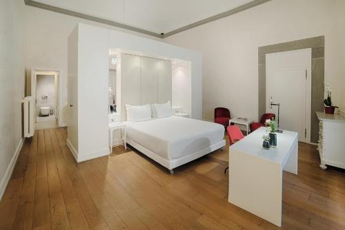 Katil atau katil-katil dalam bilik di NH Collection Firenze Porta Rossa