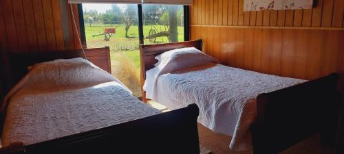 Cama o camas de una habitación en Casona en Quillón