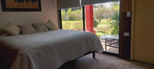 Cama o camas de una habitación en Casona en Quillón