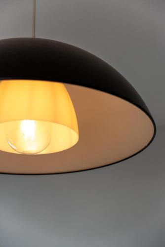 a close up of a black ceiling light at Villa Turquesa Estoril in Alcabideche