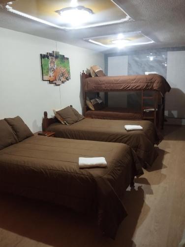 Ένα ή περισσότερα κρεβάτια σε δωμάτιο στο Hotel Residencial El Viajero