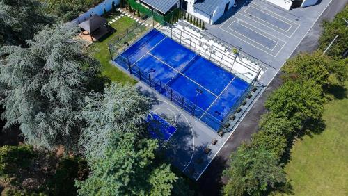 an overhead view of a swimming pool on a house at Villa Ring Pool & Padel Belgrade in Barič