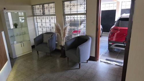 Zona de estar de Be Happy Hotel