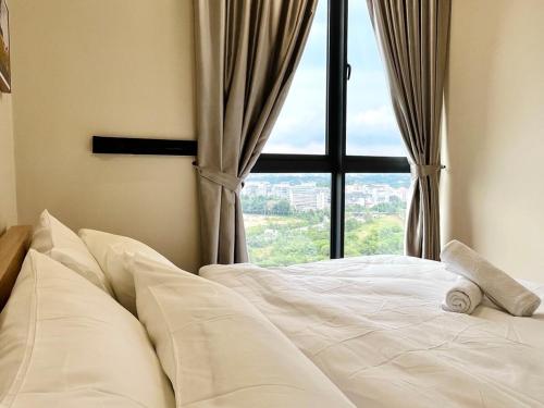 a white bed in front of a window at Calm MUJI-Inspired Home - Stunning Sunset View - Steps To IOI City Mall - Your Best Urban Retreat in Putrajaya