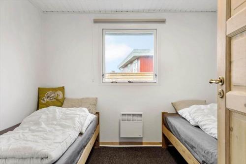 Postel nebo postele na pokoji v ubytování FY222-Otterup-Klovervaenget-13