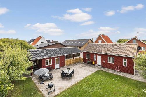 an aerial view of a house with a patio at 727-Thyboron-Magevej-10 in Thyborøn