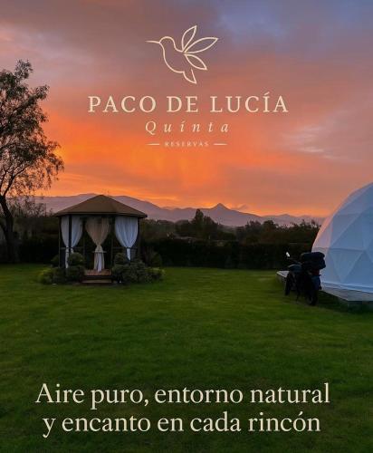 a picture of a sunset with a tent and a bird at Quinta Paco de Lucía in Yaruqui