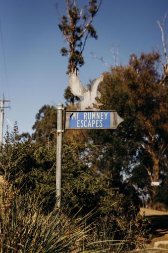 a street sign with an owl on top of it at Mount Rumney Escapes - 3 Seaview Wombat House in Mount Rumney
