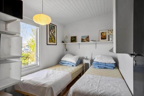 Postel nebo postele na pokoji v ubytování FY387-Otterup-Slaenvej-18