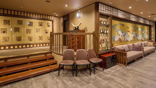 a salon with chairs and a waiting room at Kumonoue Fuji Hotel Premium room - No Mt Fuji view with open-air bath in Fujikawaguchiko