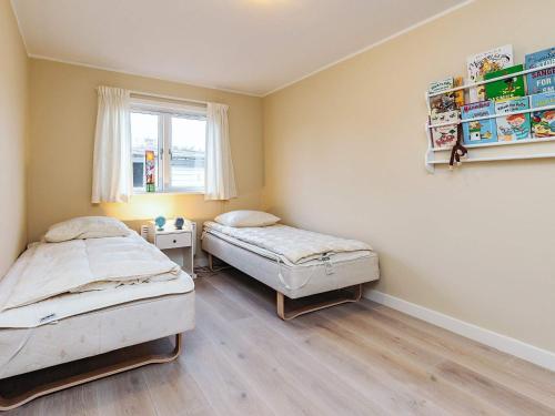 Postel nebo postele na pokoji v ubytování 10-Person Home in Rødvig Stevns