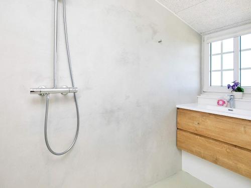 a bathroom with a shower and a sink at 20 person holiday home in Ulfborg in Ulfborg