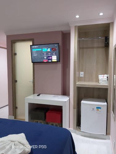 TV a/nebo společenská místnost v ubytování Pousada Recanto da Serra Domingos Martins