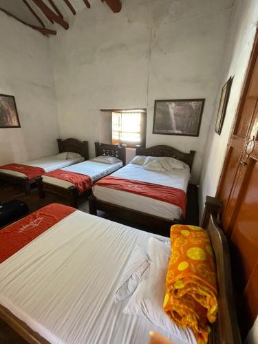 Postel nebo postele na pokoji v ubytování Hotel Casa Posada Don Chepe