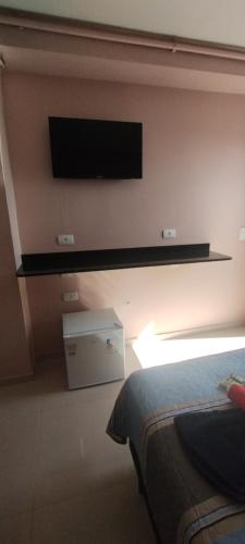 Pousada Santa Mariaにあるテレビまたはエンターテインメントセンター