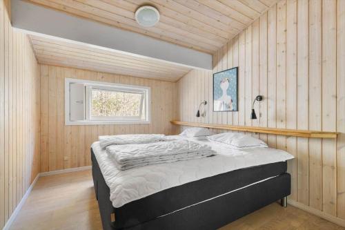 Postel nebo postele na pokoji v ubytování 2637-Nexo-Fjaelstaunijn-8