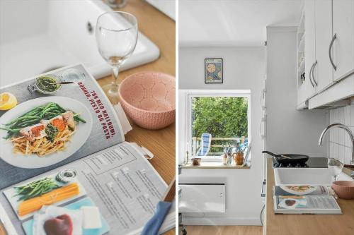a kitchen with a plate of pasta and a wine glass at 6821-Allinge-Laerkevaenget-7-B in Allinge