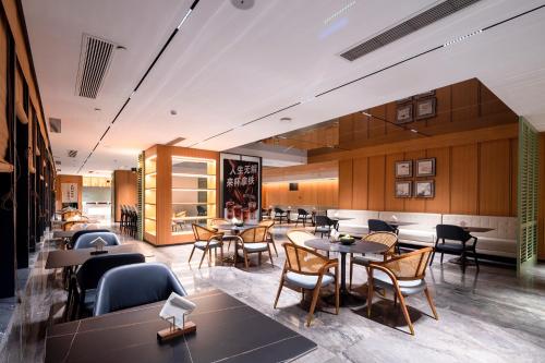 Χώρος καθιστικού στο 华星谷奈酒店郑州高铁东站店